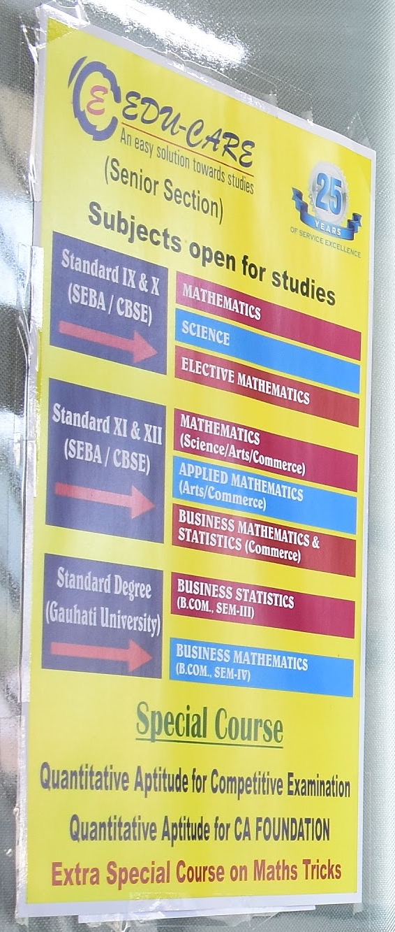 The EDU-CARE subject poster taped to the office glass